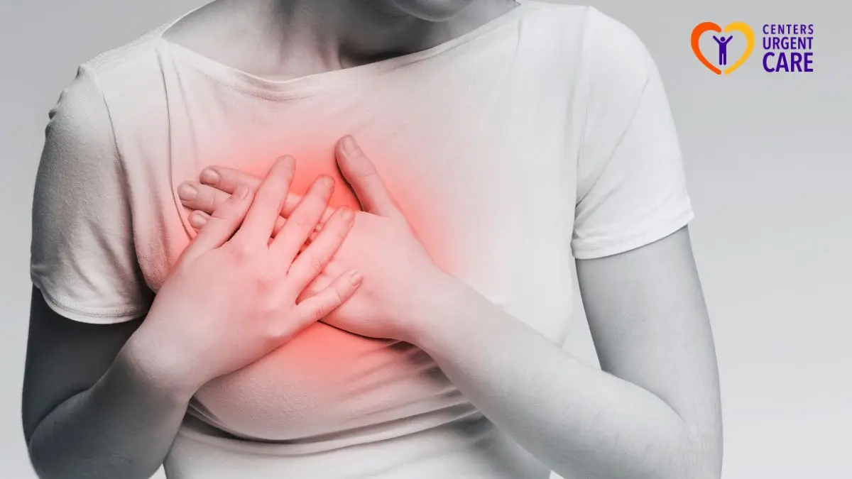 person-holding-chest-pain-symptoms-possible-heart-attack-close-up